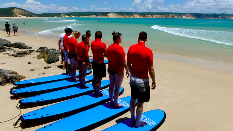 Join Epic Ocean Adventures for the ultimate surf lesson at Double Island Point! We take you by specialised 4WD's from Rainbow Beach, passed the Coloured Sand Cliffs to Double Island Point for a surf lesson you'll never forget.